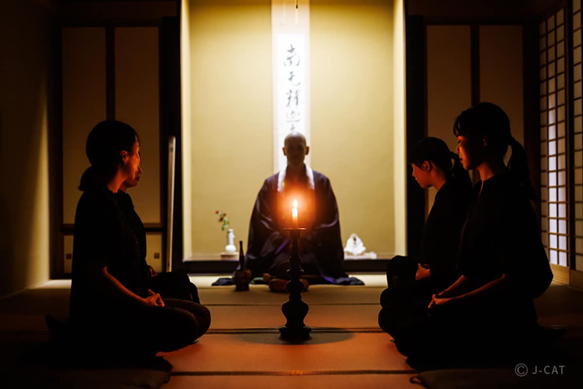 Luxury Experiences in Kyoto Students and master meditating in a room