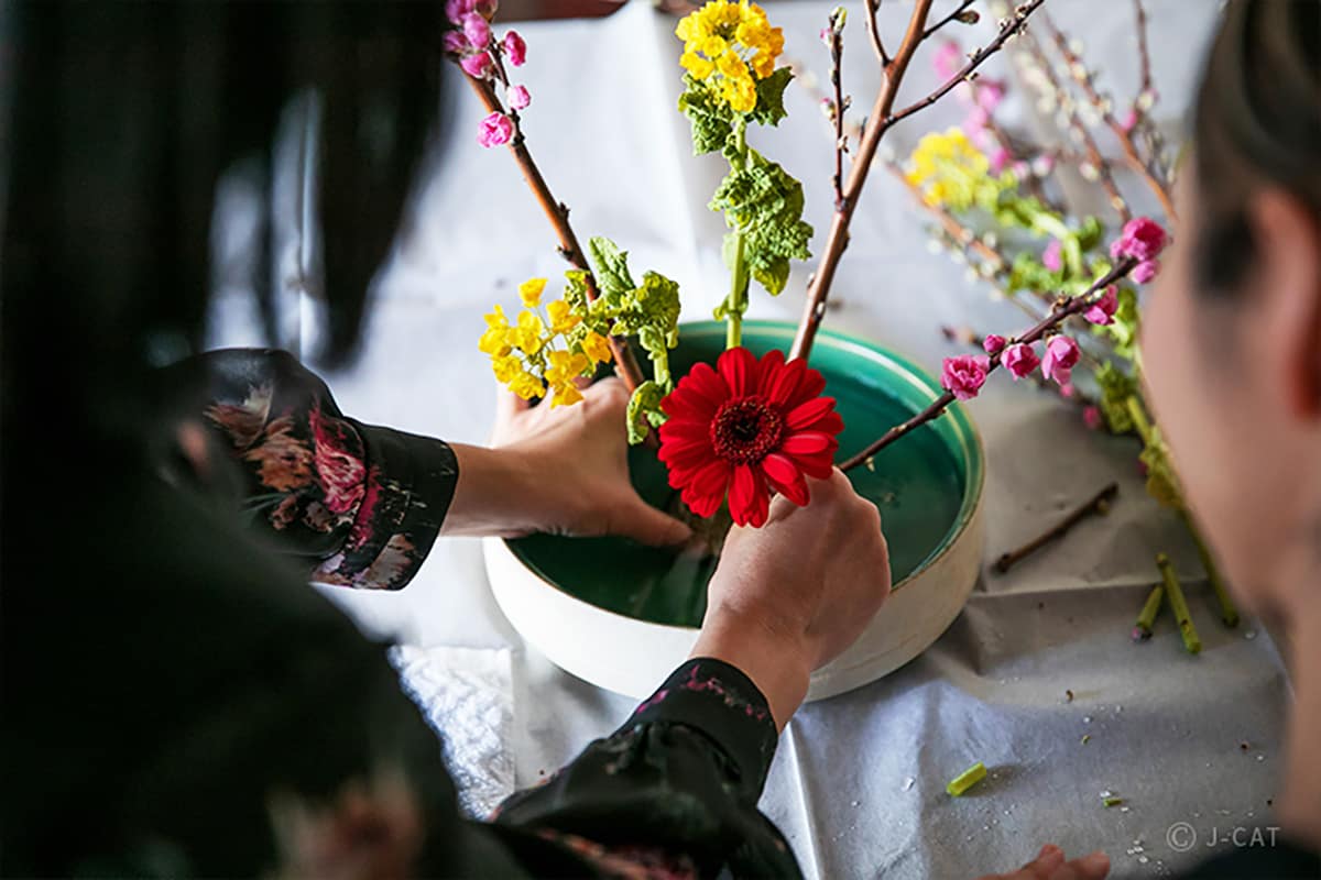 Luxury Experiences in Tokyo Woman arranging flowers