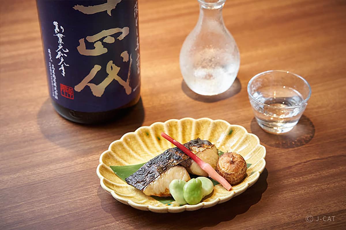 Luxury Experiences in Tokyo Sake with Japanese dishes