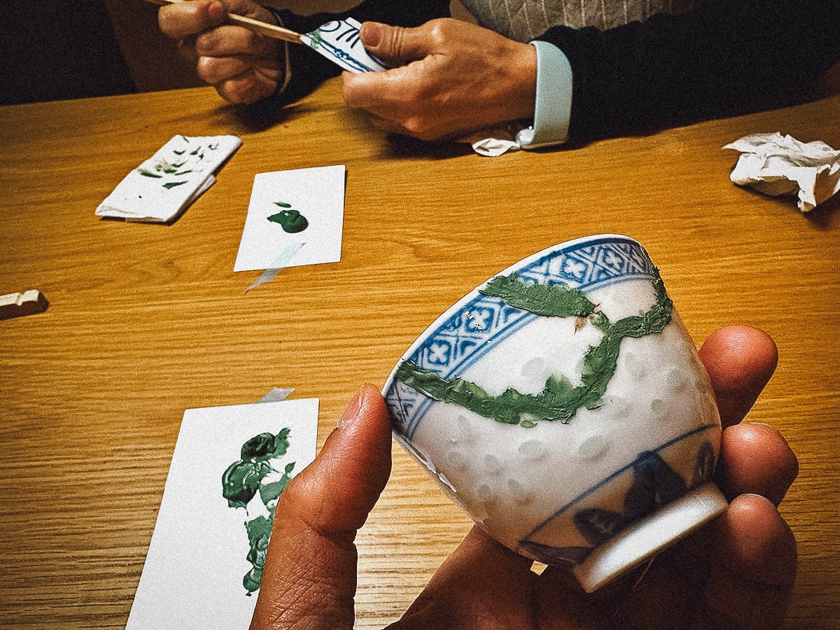 Kintsugi in Kyoto Shallow cracks filled in with green filler