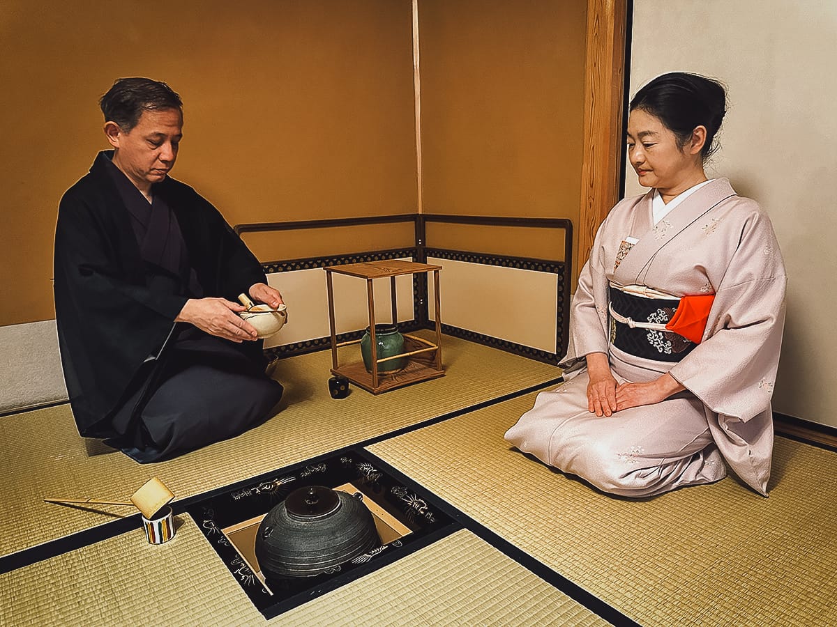 The Japanese Tea Ceremony Japanese man and woman preparing tea